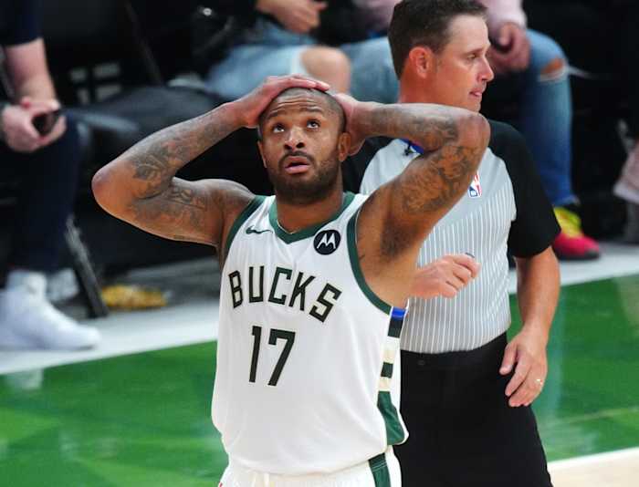 Milwaukee Bucks forward P.J. Tucker (17) reacts 